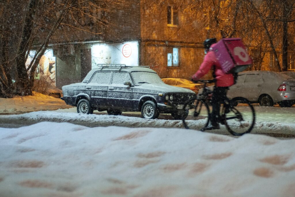 snowy bike courier